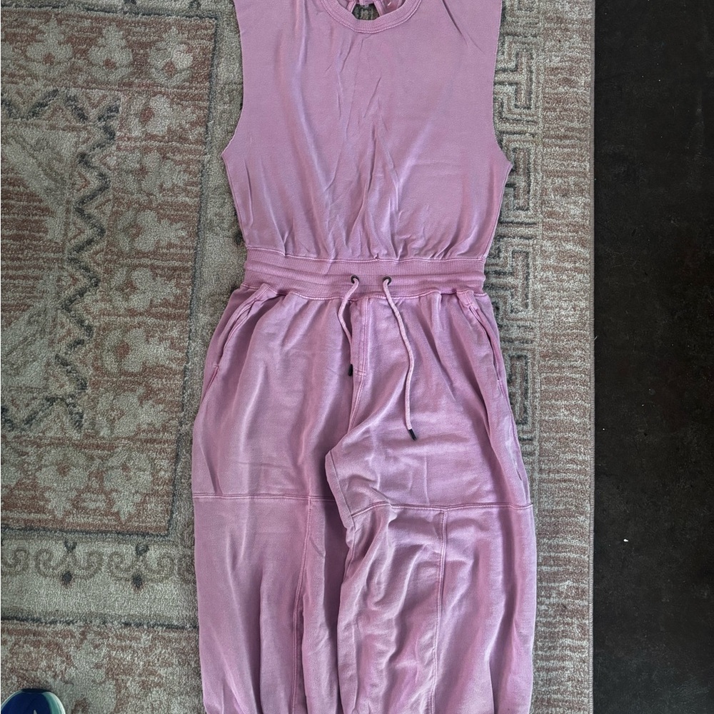 Pink Free People movement size medium throw and go romper jumpsuit